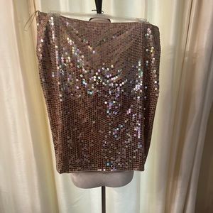 Add holiday sparkle with this beaded pencil skirt from Calvin Klein.